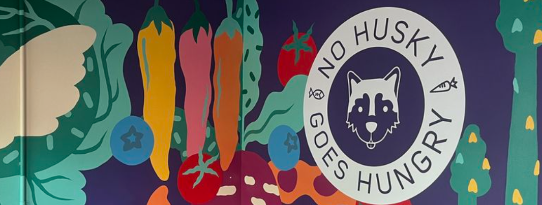 Colorful Mural with text "no husky goes hungry"